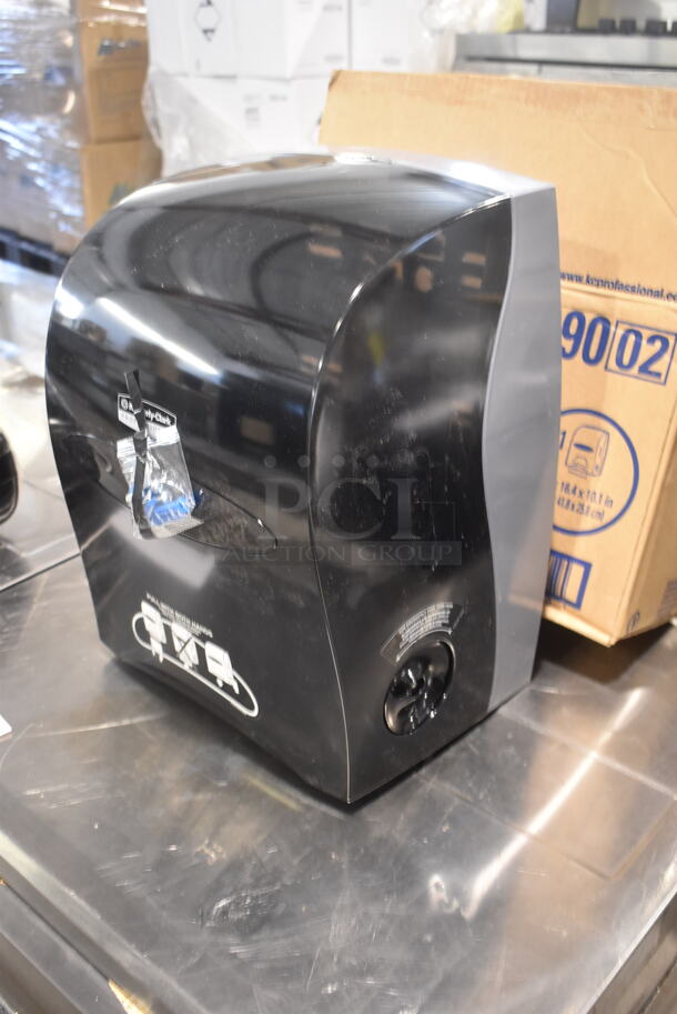 BRAND NEW IN BOX! Kimberly Clarke Black Poly Wall Mount Toilet Paper Dispenser. - Image 3 of 5