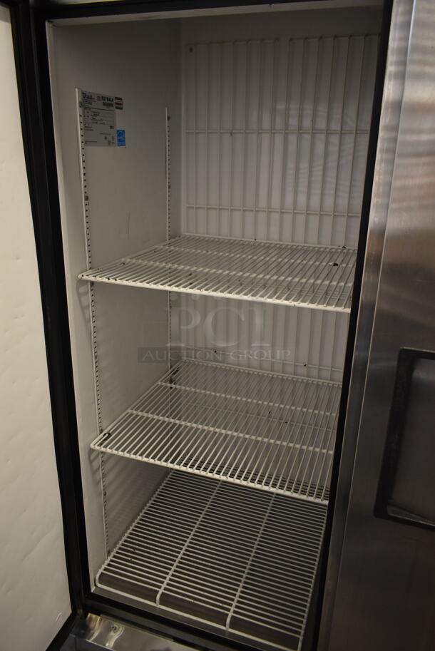 2015 True T-72F ENERGY STAR Stainless Steel Commercial 3 Door Reach In Freezer w/ Poly Coated Racks on Commercial Casters. 115 Volts, 1 Phase. Tested and Working! - Image 6 of 9