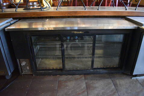 2013 True TBB-24-72G-SD Metal Commercial 3 Door Back Bar Cooler Merchandiser. BUYER MUST REMOVE. 115 Volts, 1 Phase. 73x24.5x36. Item Was in Working Condition on Last Day of Business. (Susquehanna Ale House)