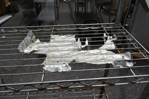 Chrome Finish 4 Tier Wire Shelving Unit. BUYER MUST DISMANTLE. PCI CANNOT DISMANTLE FOR SHIPPING. PLEASE CONSIDER FREIGHT CHARGES. - Image 3 of 5