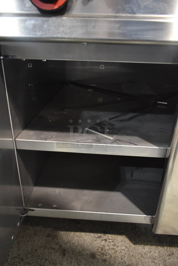 Lotus Stainless Steel Commercial Gas Powered 4 Burner Range w/ Center Burner, Under Shelf and 3 Doors. - Image 5 of 6
