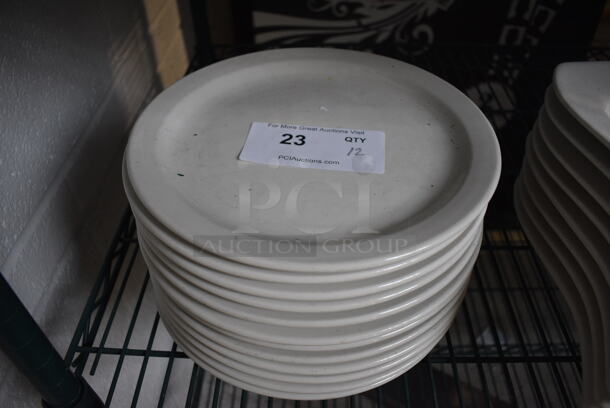 12 White Ceramic Plates. 10x10x1. 12 Times Your Bid!