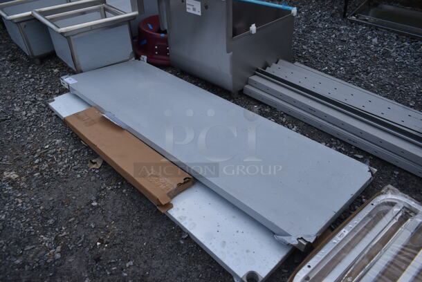 BRAND NEW SCRATCH AND DENT! Regency 600T2472G 24" x 72" 18-Gauge 304 Stainless Steel Commercial Work Table with Galvanized Legs and Undershelf  - Image 3 of 5