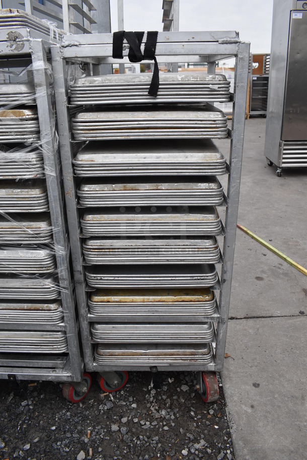 Metal Commercial Pan Transport Rack on Commercial Casters w/ 58 Metal Full Size Baking Pans. 21x26x52. 18x26x1