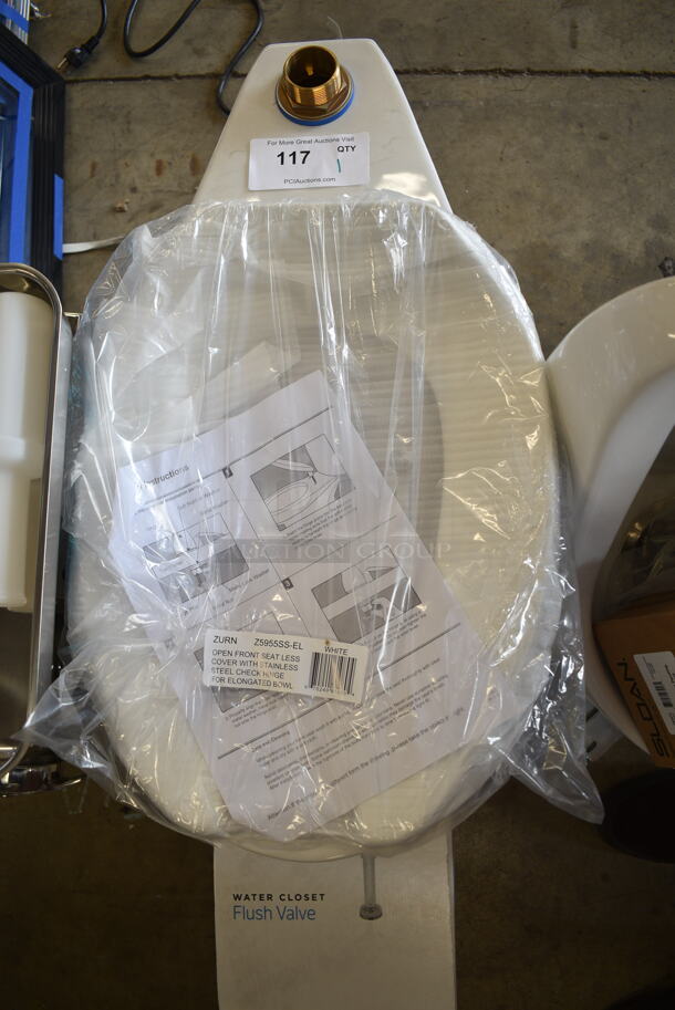 BRAND NEW SCRATCH AND DENT! White Toilet w/ Zurn Z5955SS-EL Toilet Seat and Zurn Flush Valve.  - Image 3 of 8