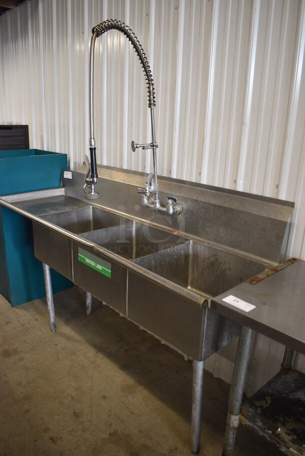 Stainless Steel Commercial 3 Bay Sink w/ Left Side Drainboard, Faucet, Handles and Spray Nozzle Attachment. 75x24x71. Bays 18x18x10. Drainboard 17x21x1
