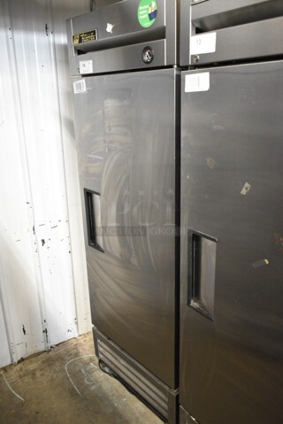 2016 True T-19F Stainless Steel Commercial Single Door Reach In Freezer w/ Poly Coated Racks and Commercial Casters. 115 Volts, 1 Phase. Tested and Working!