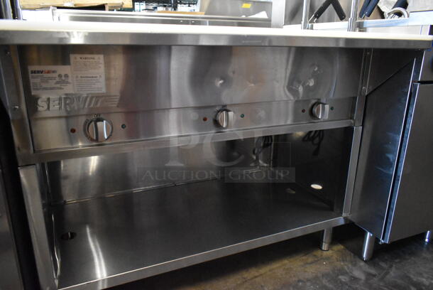 BRAND NEW SCRATCH AND DENT! 2023 ServIt 423EST3WSPB Stainless Steel Commercial Floor Style Electric Powered 3 Pan Sealed Well Electric Powered Partially Enclosed Base Steam Table. 120 Volts, 1 Phase. Tested and Working! - Image 7 of 9