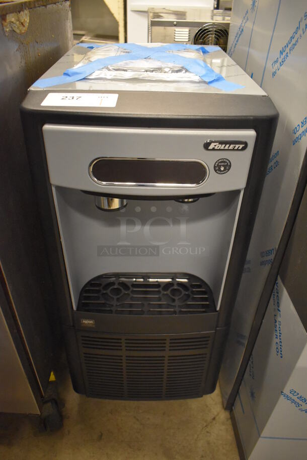 BRAND NEW SCRATCH AND DENT! 2022 Follett 7UD100A Stainless Steel Commercial Ice and Water Dispenser. 115 Volts, 1 Phase. 14.5x23x31.5