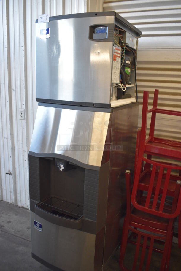 Manitowoc Model ID0522A-161D Stainless Steel Commercial Ice Machine Head on Commercial Hotel Dispenser Bin. 115 Volts, 1 Phase. 22x31x75.5