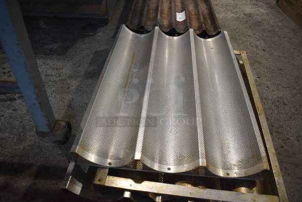 4 Metal Perforated 3 Loaf Baking Pans. 18x26x1. 4 Times Your Bid! - Image 1 of 3