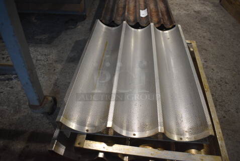 4 Metal Perforated 3 Loaf Baking Pans. 18x26x1. 4 Times Your Bid!