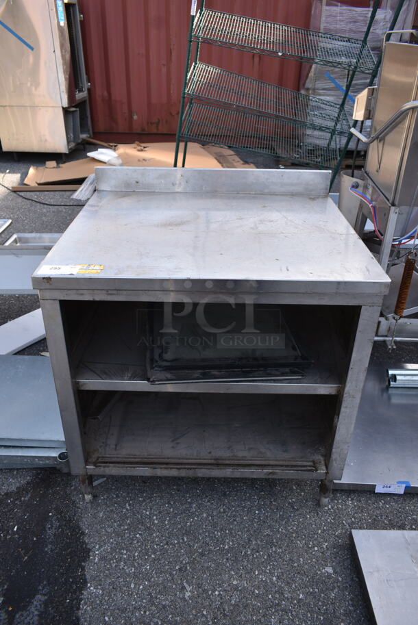 Stainless Steel Table w/ Back Splash and 2 Under Shelves. - Image 1 of 5