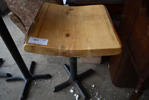 Wooden Dining Height Table w/ Live Edge on Black Metal Table Base. 