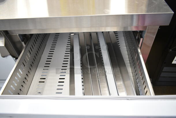 BRAND NEW SCRATCH AND DENT! 2023 Avantco 178SSUD3R Stainless Steel Commercial Undercounter Cooler w/ Door and 4 Drawers on Commercial Casters. 115 Volts, 1 Phase. Tested and Powers On But Does Not Get Cold - Image 7 of 11