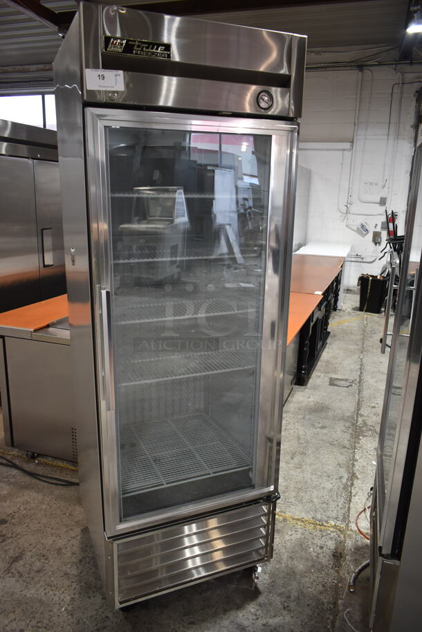 True T-23FG Stainless Steel Commercial Single Door Reach In Cooler Merchandiser w/ Poly Coated Racks on Commercial Casters. 115 Volts, 1 Phase. Tested and Powers On But Does Not Get Cold - Image 1 of 5