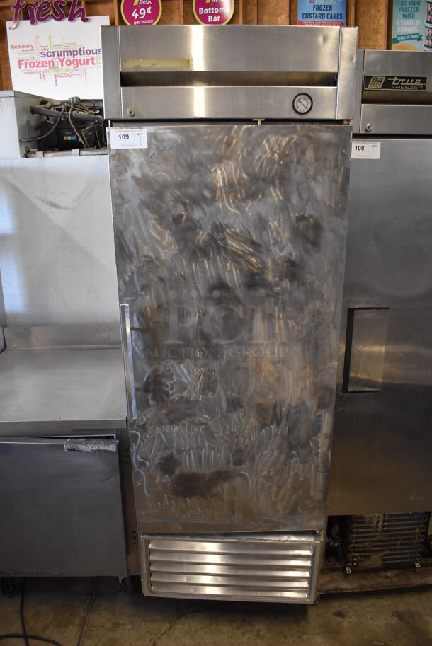 True T-23 Metal Commercial Single Door Reach In Cooler on Commercial Casters. 115 Volts, 1 Phase. 27x30x83. Tested and Powers On But Does Not Get Cold - Image 1 of 6