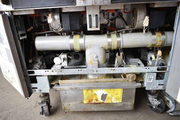 2019 Frymaster BIGLA430-8TSD Stainless Steel Commercial Natural Gas Powered 4 Bay Deep Fat Fryer w/ Filtration System on Commercial Casters. 105,000 BTU.  - Image 8 of 12