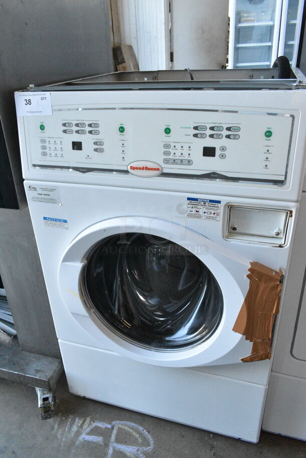 BRAND NEW SCRATCH AND DENT! Speed Queen Front Load Combo Washer and Dryer. 120/208-240 Volts.  - Image 1 of 7