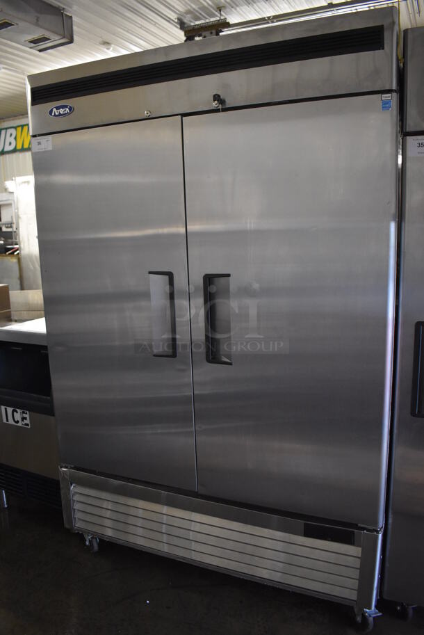 2020 Atosa MBF8503GR Stainless Steel Commercial 2 Door Reach In Freezer w/ Poly Coated Racks on Commercial Casters. 115 Volts, 1 Phase. 54x32x83. Tested and Working! - Image 1 of 8