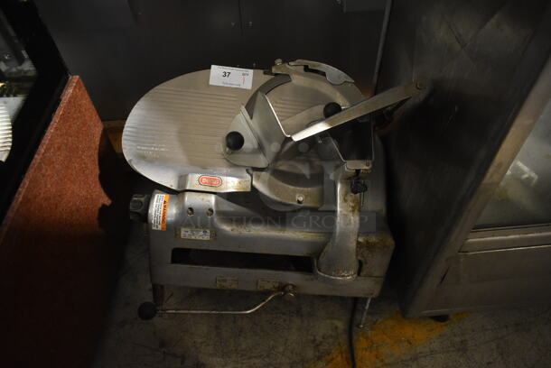 Berkel 919/1 Stainless Steel Commercial Countertop Meat Slicer w/ Blade Sharpener. 115 Volts, 1 Phase. Tested and Powers On But Parts Do Not Move