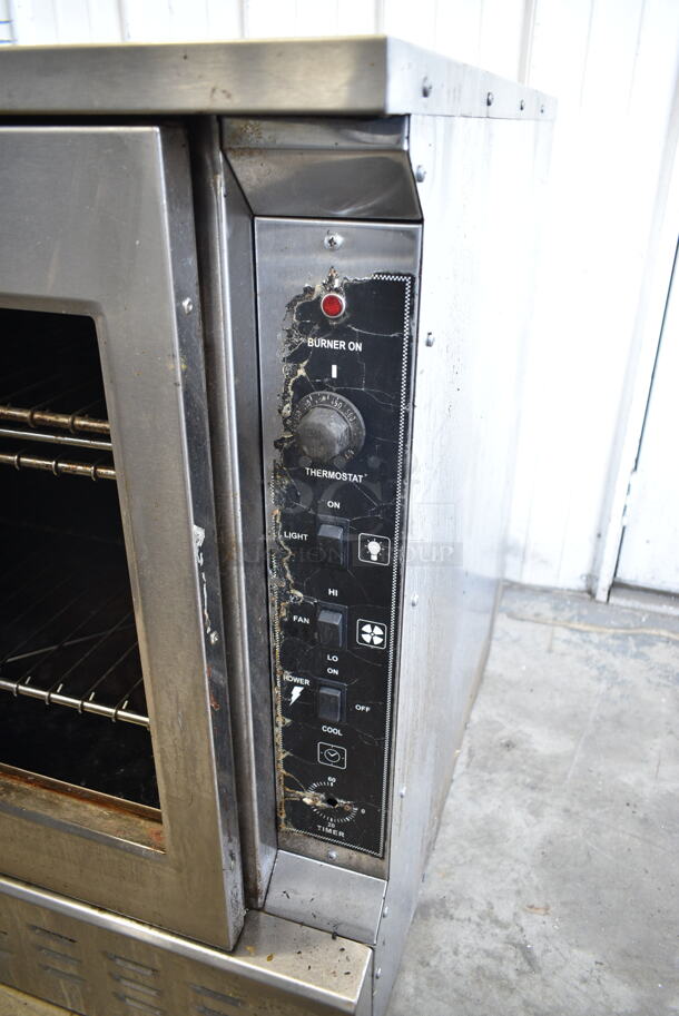 Royal Stainless Steel Commercial Gas Powered Full Size Convection Oven w/ Solid Door, View Through Door, Metal Oven Racks and Thermostatic Controls. See Pictures for Broken Glass Door.  - Image 2 of 5