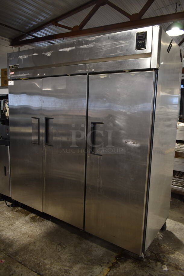 True TG3R-3S Stainless Steel Commercial 3 Door Reach In Cooler w/ Poly Coated Racks on Commercial Casters. 115 Volts, 1 Phase. Tested and Working!