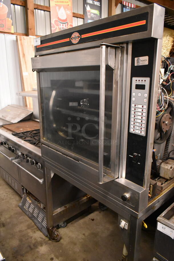 Cleveland BMR-32 Stainless Steel Commercial Natural Gas Powered Rotisserie Oven w/ Skewers and Legs on Commercial Casters. 45,000-60,000 BTU.