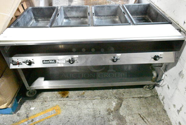 Vollrath Servewell 38104 Stainless Steel 4 Bay Steam Table w/ Under Shelf on Commercial Casters. 120 Volts, 1 Phase. Cannot Test Due To Plug Style - Image 1 of 8