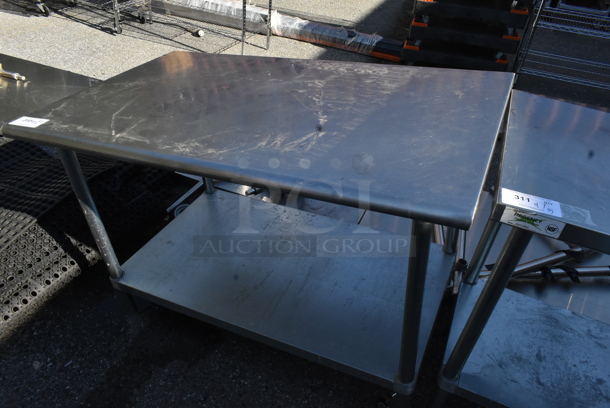 Stainless Steel Table w/ Metal Under Shelf on Commercial Casters. Missing 1 Caster.