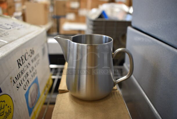 6 BRAND NEW IN BOX! Stainless Steel Pitchers. 4x2.5x2.5. 6 Times Your Bid!