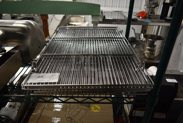 12 BRAND NEW Metal Racks. 12 Times Your Bid!