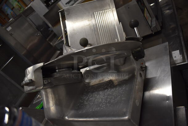 Berkel Stainless Steel Commercial Countertop Meat Slicer. 115 Volts, 1 Phase. 19x25x21. Tested and Powers On But Parts Do Not Move - Image 5 of 6