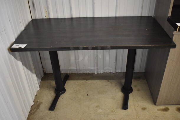Wood Pattern Table on 2 Black Metal Straight Leg Table Bases. 48x24x29