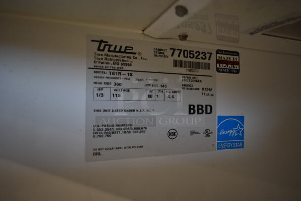 2013 True TG1R-1S ENERGY STAR Stainless Steel Commercial Single Door Reach In Cooler w/ Poly Coated Racks on Commercial Casters. 115 Volts, 1 Phase. Tested and Working! - Image 7 of 7