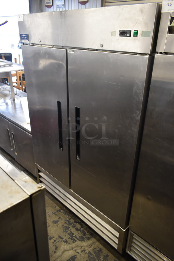 Arctic Air AF49 Stainless Steel Commercial Double Door Reach In Freezer w/ Poly Coated Racks on Commercial Casters. 115 Volts, 1 Phase. Tested and Working! - Image 1 of 7