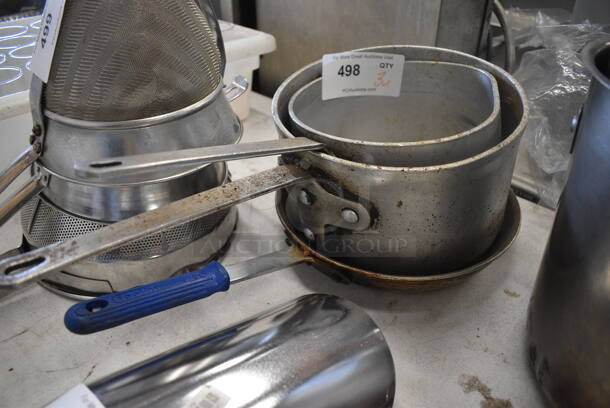 3 Various Metal Items; 2 Sauce Pots and 1 Skillet. Includes 16x8.5x5.5. 3 Times Your Bid!