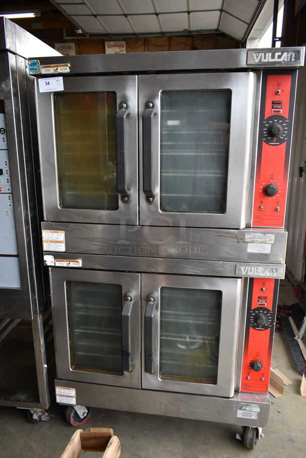 2 Vulcan ENERGY STAR Stainless Steel Commercial Natural Gas Powered Full Size Convection Ovens w/ View Through Doors, Metal Oven Racks and Thermostatic Controls on Commercial Casters. 2 Times Your Bid! - Image 1 of 11