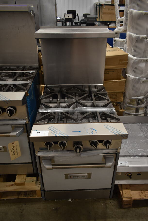 BRAND NEW SCRATCH AND DENT! 2022 Garland G24-4L Stainless Steel Commercial Natural Gas Powered 4 Burner Range w/ Oven, Over Shelf and Back Splash. 