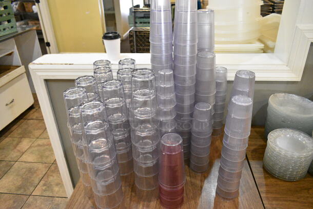 Wood Pattern Dining Height Table w/ Contents Including Poly Beverage Tumblers. (main dining room) - Image 2 of 4
