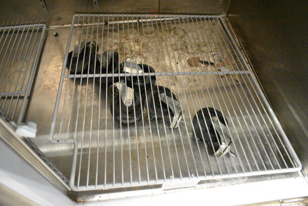 Endura MNR806SSG/0 Stainless Steel Commercial 6 Half Size Door Reach In Cooler Merchandiser w/ Poly Coated Racks and Commercial Casters. 115 Volts, 1 Phase. Tested and Working! - Image 6 of 11