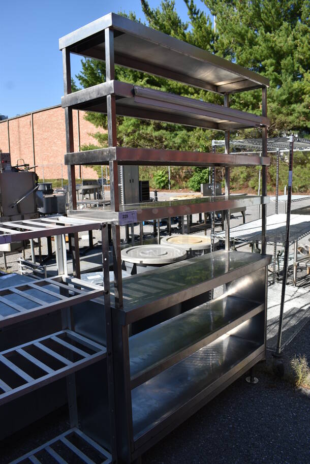 Stainless Steel Table w/ 4 Over Shelves and 2 Under Shelves. 54x16x82