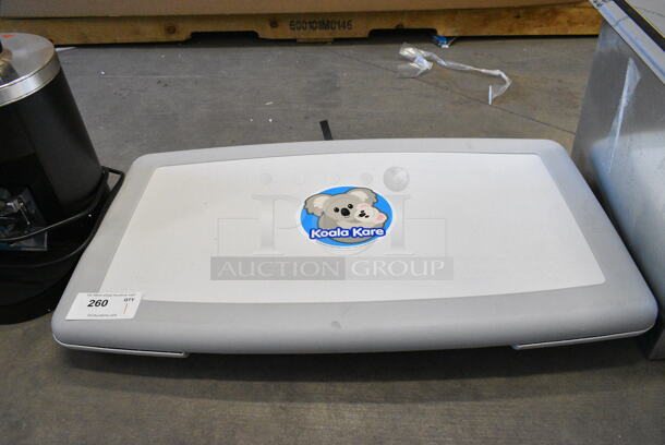 BRAND NEW SCRATCH AND DENT! Koala Kare KB300-05 White Granite Horizontal Surface-Mounted Baby Changing Station - Image 2 of 7