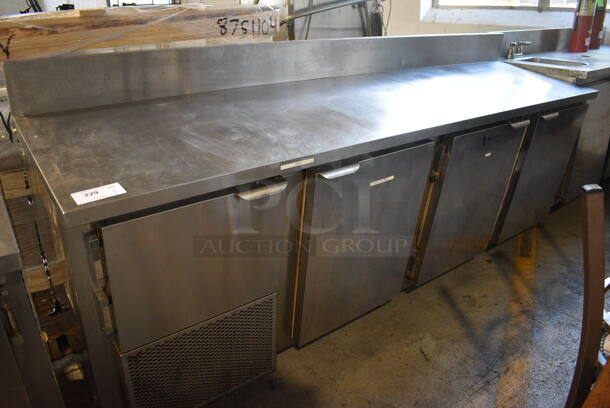 CustomCool Stainless Steel Commercial Work Top 4 Door Cooler w/ Backsplash. 96.5x24.5x45. Tested and Powers On But Does Not Get Cold