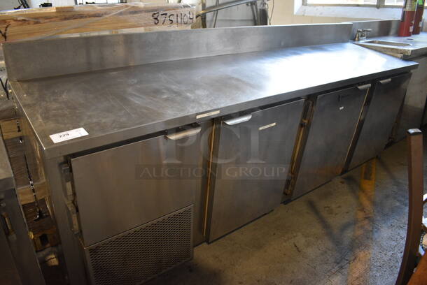 CustomCool Stainless Steel Commercial Work Top 4 Door Cooler w/ Backsplash. 96.5x24.5x45. Tested and Powers On But Does Not Get Cold - Image 1 of 6
