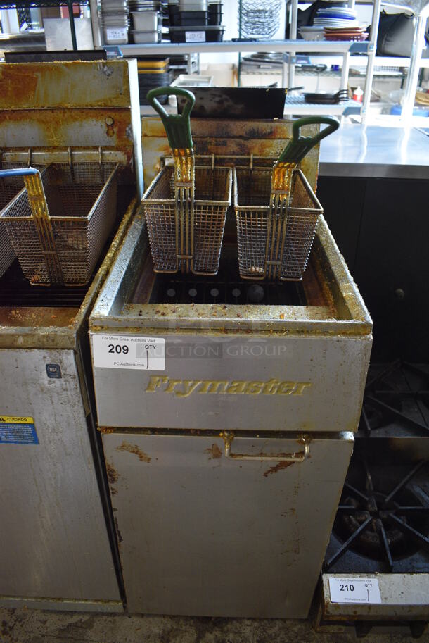 Frymaster Model GF14SD Stainless Steel Commercial Floor Style Natural Gas Powered Deep Fat Fryer w/ 2 Metal Fry Baskets on Commercial Casters. 100,000 BTU. 15.5x29x46