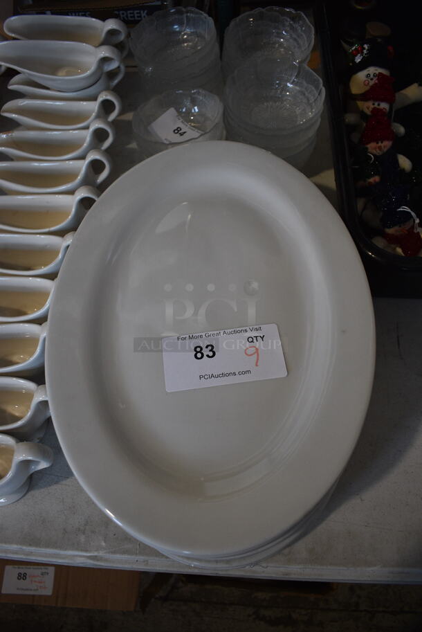 9 White Ceramic Oval Plates. 11.5x16x1. 9 Times Your Bid!