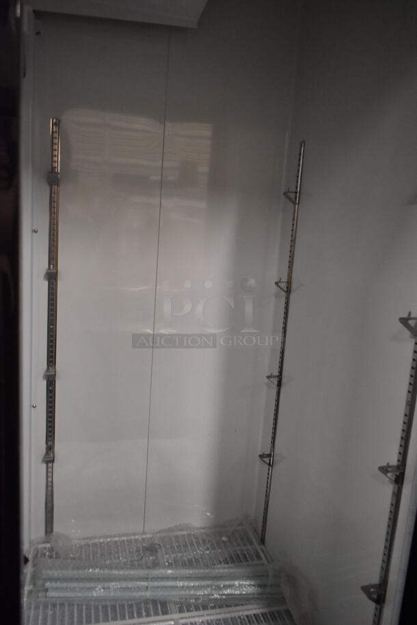 BRAND NEW SCRATCH AND DENT! 2024 Avantco 178GDS47HCB Metal Commercial Black Sliding Glass Door Merchandiser Refrigerator with LED Lighting and Poly Coated Racks on Commercial Casters. 115 Volts, 1 Phase. Tested and Working! - Image 5 of 7