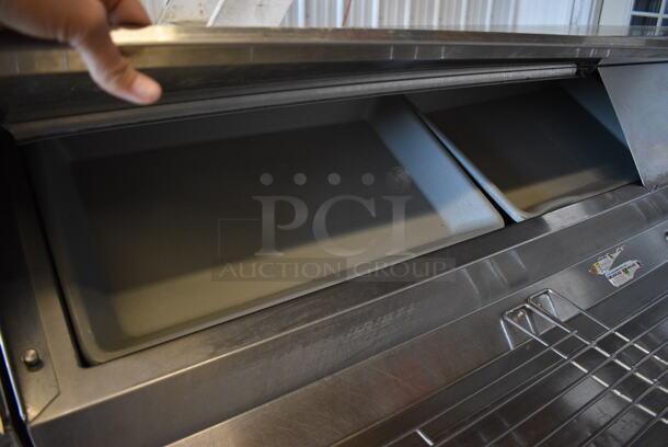 Randell Stainless Steel Commercial Prep Table on Commercial Casters. 115 Volts, 1 Phase. 120x34x51. Tested and Powers On But Temps at 50 Degrees - Image 3 of 12