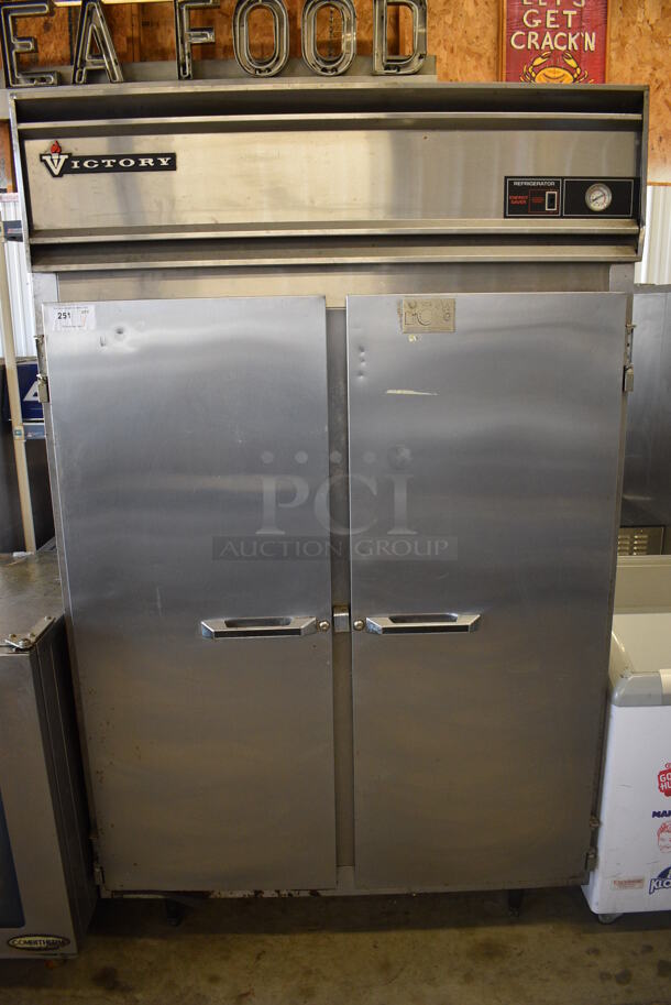 Victory Model RA-2D-7 Stainless Steel Commercial 2 Door Reach In Cooler. 115 Volts, 1 Phase. 52x36x84.5. Tested and Powers On But Temps at 53 Degrees